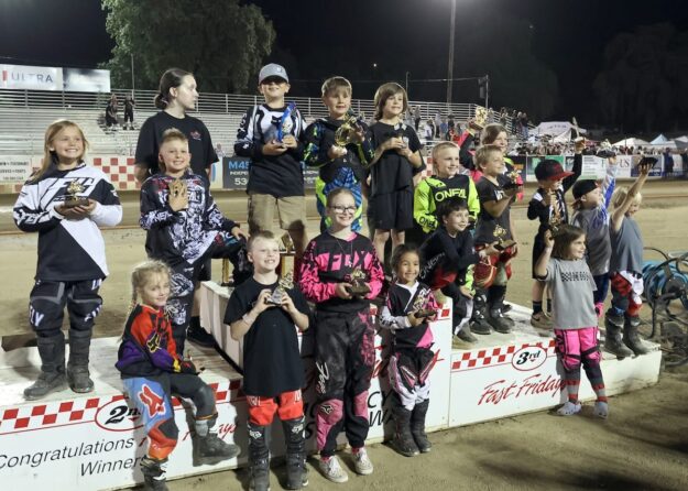 Twenty-five young riders pick up their trophies for competing in the Pee-Wee division. May 09 2025 - Michelob Ultra Speedway Season Opener.