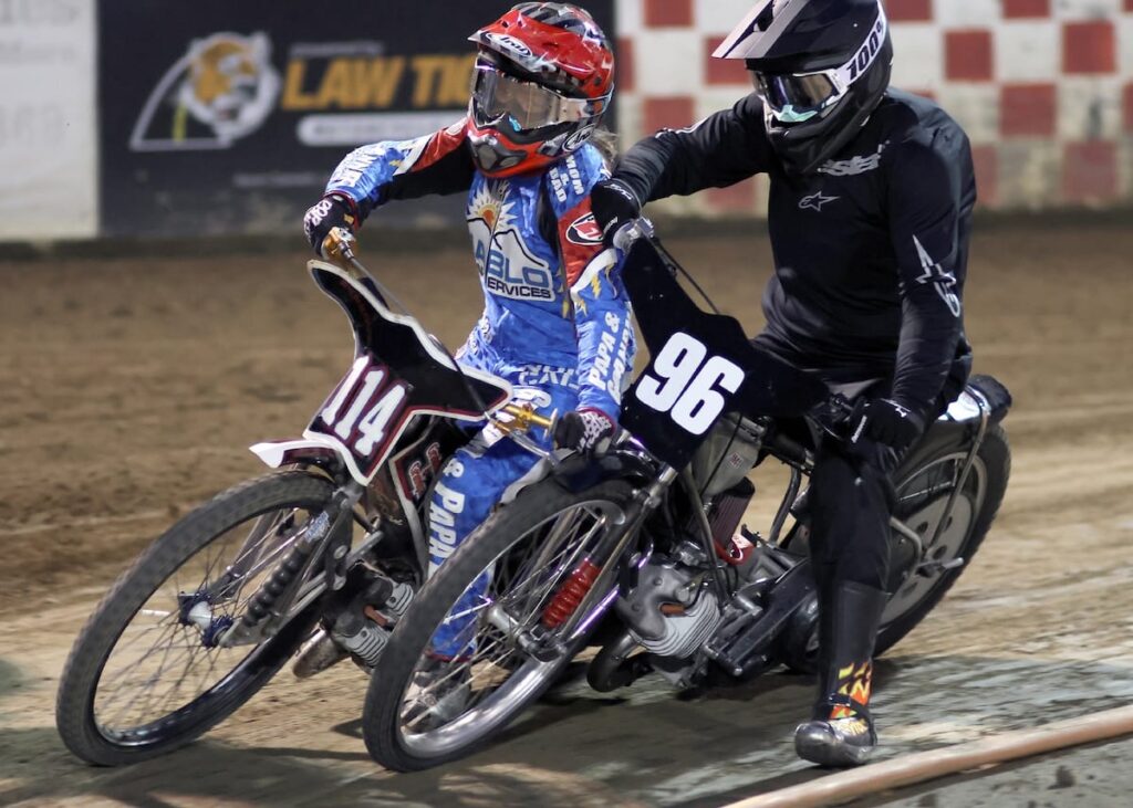 Gracie Janniro (L) and Justin Gist (R) get tight in a turn during a Youth 250cc heat race. May 30 2025 - More great racing at Fast Friday’s Motorcycle Speedway in Auburn CA.