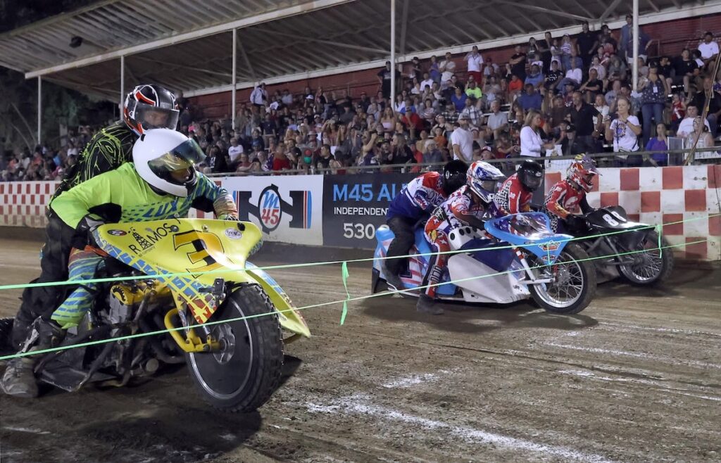 The start of the Extreme Sidecar main event. Joe Jones and Johnny Glover (middle) were second to Robert Curry and Michael McGovern (near) in two of their heat races but overcame Curry and McGovern in the main event. July 4 2025 - Great 4th of July celebration and races.
