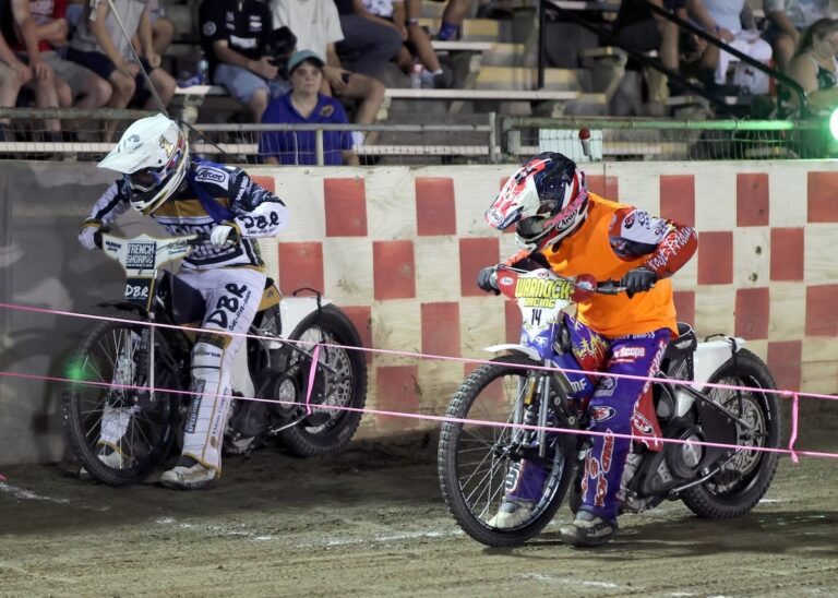 Broc Nicol (left) and Billy Janniro (right) square off in the first heat of the Team Challenge championship. Nicol was racing as the Joker for extra points for his Team IFC. Aug 8 2025 - Championship racing begins at Fast Friday’s Motorcycle Speedway in Auburn, CA.