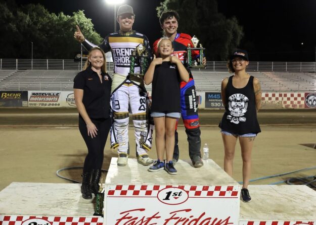 Broc Nicol (left back) and Greg Moore (back right) celebrate their wins Friday night, Nicol (the scratch main and Moore the handicap main) with Fast Friday's trophy girls (left-right) Kelly Craven, Lily Sneed and Leni Crow. Aug 8 2025 - Championship racing begins at Fast Friday’s Motorcycle Speedway in Auburn, CA.