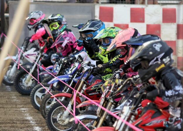 Looking fancy in their racing suits the pee-wees line up for a heat race. July 25 2025 - Great racing is continuing at Fast Fridays in Auburn Ca.