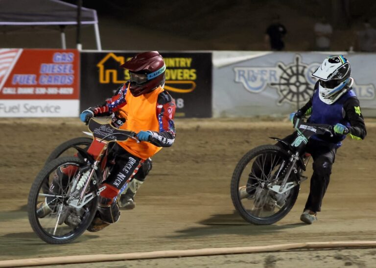 Brothers Timmy Dion (left) and Anthony Dion (right) race in the fifth round of the Team Challenge. The brothers were on opposite teams, Tim Dion on the Law Tigers and Anthony Dion riding for Team IFC. Team Law Tigers outscored Team IFC in this round 11-7. July 25 2025 - Great racing is continuing at Fast Fridays in Auburn Ca.