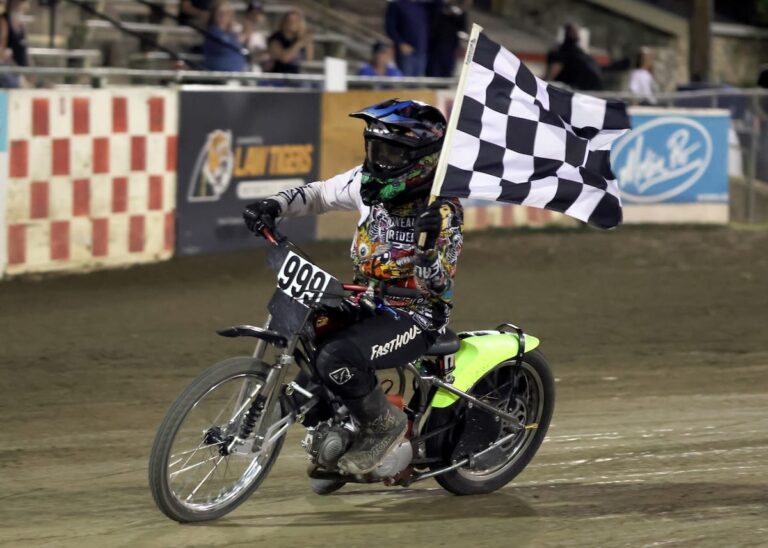 Hank Hanaway takes a victory lap after winning the Youth 150cc D2 main event. The main event win was Hanaway's second in a row. Sept 20 2025 - Thrilling third round of the AMA National Speedway Championship at Fast Fridays Motorcycle Speedway in Auburn, CA.