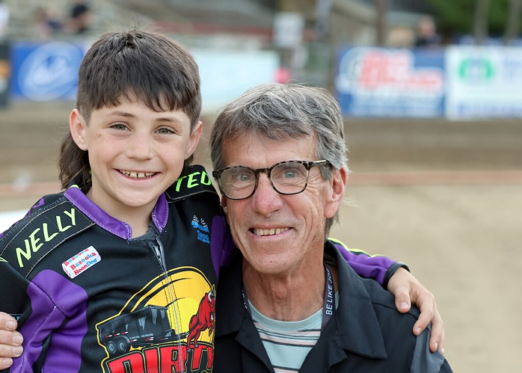 Liam Falcon (left) and Fast Friday's announcer Mike Rooney pose for a pre-race photo before opening night at Fast Friday's Motorcycle Speedway Friday night. Falcon went on the win the Youth 150cc D1 main event. May 22 2026 - Great opening night for Fast Friday’s Motorcycle Speedway in Auburn, CA.