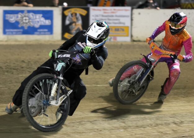 Anthony Dion leads Russell Green in a heat race. Dion picked up his first main event of the season in the handicap main event. June 12 2026 - 2026 Speedway & Team Challenge Round #2.