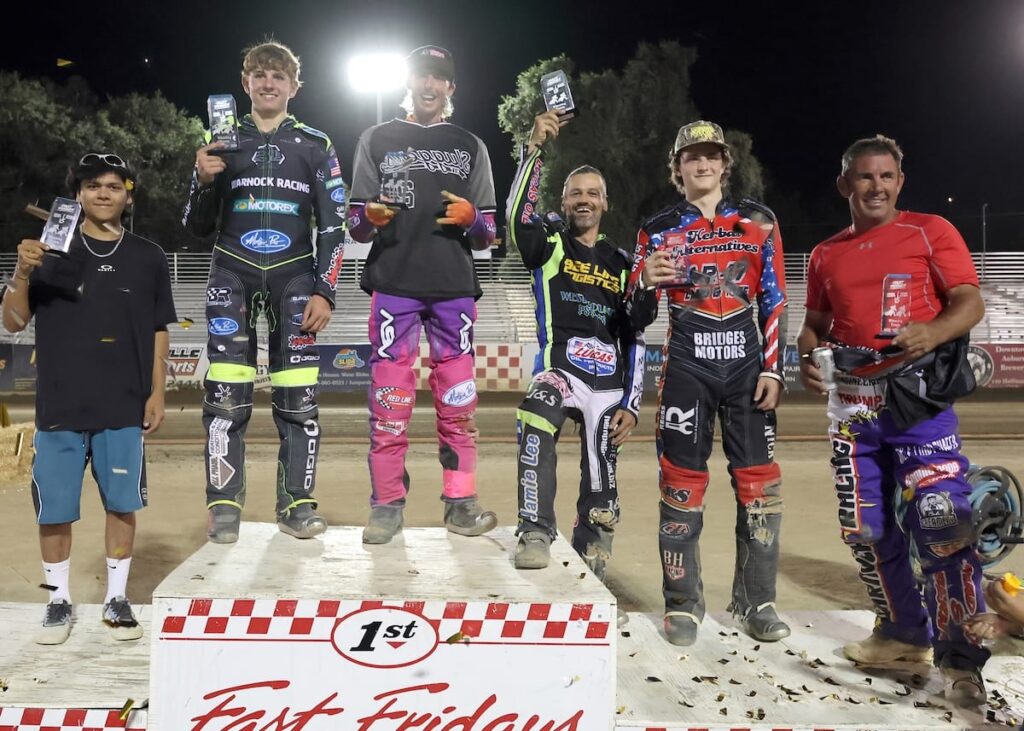The North Team celebrates on the winner's podium after winning the 2026 season North vs. South Challenge at Fast Fridays. In a very close meeting, the North scored 69 points to the South's 66. Pictured (left-right) Darren Armbruster, Brady Landon, Russell Green, Danny Faria, Timmy Dion and Billy Janniro. July 17 2026 - 2026 Budweiser’s North vs. South Challenge.
