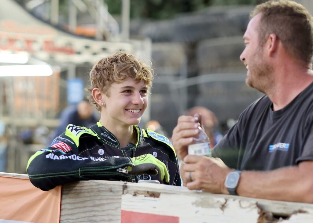 Brady Landon (left) shares a laugh in the Fast Friday's pit during a break in the racing action. Landon won both the scratch and handicap main events. July 24 2026 - 2026 Speedway & Team Challenge Round #5.