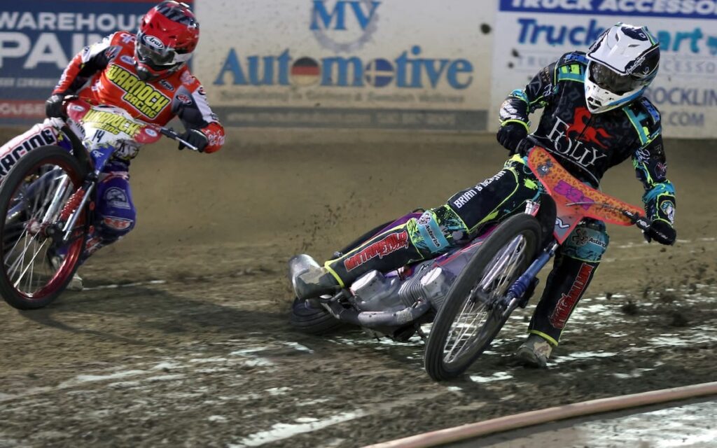 Chris Kerr (right) races in a heat race against Billy Janniro (left). Kerr and teammate Russell Green came in second place in the Speedways Best Pairs Championship scoring 35 points. Aug 21 2026 - 2026 Speedway Best Pairs Championship.