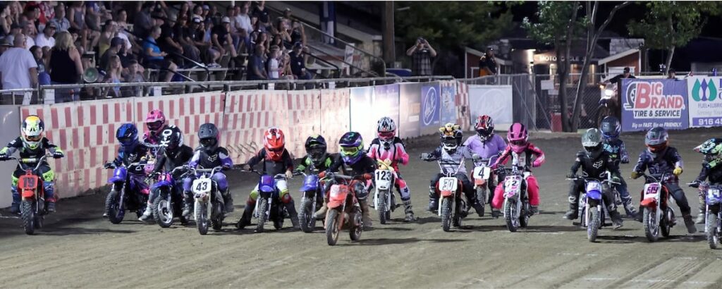 The very popular Pee-Wees line up for a heat race. The Pee-Wees are fan favorites at Fast Fridays. Aug 7 2026 - 2026 Speedway & Extreme Sidecars Round #3.