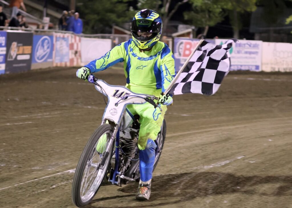 Jeff Schoenstein celebrates his win in the Support D3 main event. It was the fourth time this season Schoenstein has made the victory lap. Aug 29 2026 - 2026 Speedway & Extreme Sidecars Round #4.