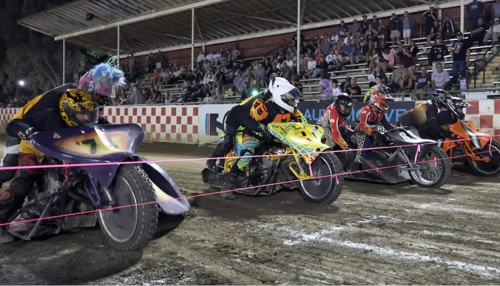The start of the sidecar main event. Robert Curry and Laurie Curry (second from left) won the main event. Aug 29 2026 - 2026 Speedway & Extreme Sidecars Round #4.