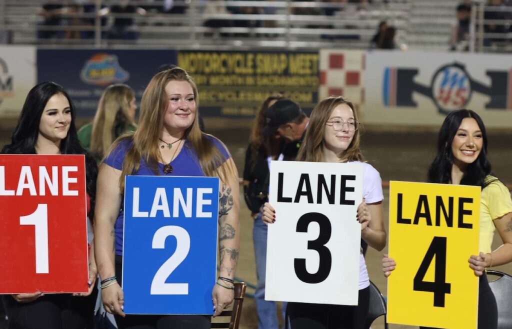 All the pageantry of a champion race were on display at Fast Fridays. Lane girls helped riders to their lane positions. Sept 19 2026 - 2026 AMA National Speedway Championship Series Final.