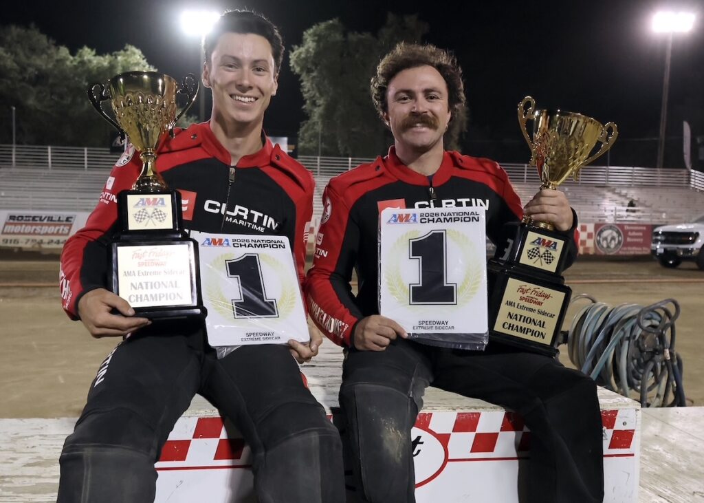 The sidecar team of Kyle Collins (left) and Justin Zmina (right), AMA National Sidecar Champions with their number one plates. Sept 26 2026 - 2026 AMA Extreme Sidecar National Championship & Youth 250cc and 150cc Nationals.