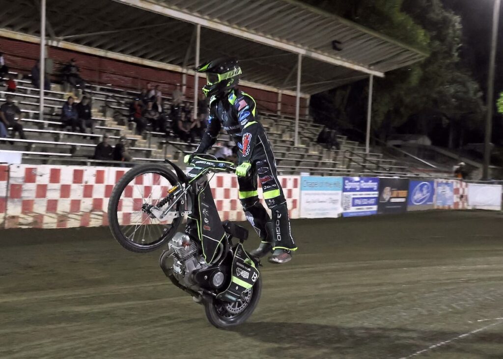 Brady Landon celebrates his perfect night winning the 2026 Fast Fridays Track Championship with a wheelie victory lap. Sept 5 2026 - 2026 Fast Fridays Track & Pee Wee Championships.